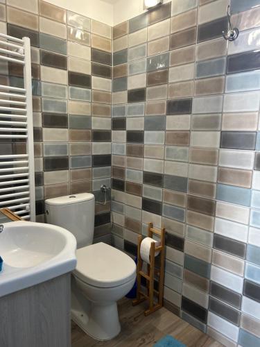 Koupelna v ubytování Relaxxa Apartman
