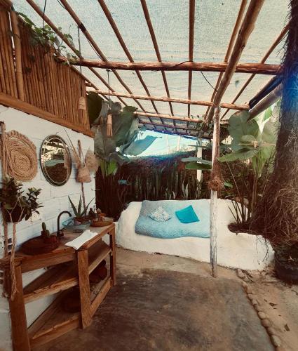a room with a bed and a swimming pool at Private cabin with mountains view in Estación El Salto