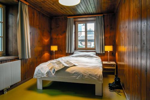 Ένα ή περισσότερα κρεβάτια σε δωμάτιο στο Landhus Almens