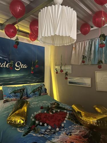 Ένα ή περισσότερα κρεβάτια σε δωμάτιο στο Under Sea Guest House