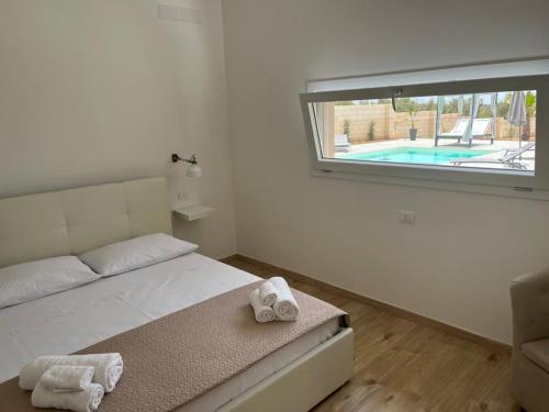 Ένα ή περισσότερα κρεβάτια σε δωμάτιο στο VILLA ASTORE