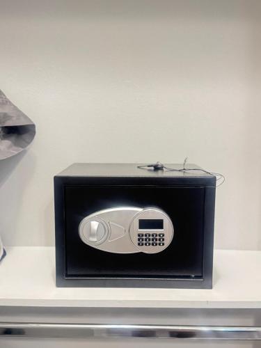 a computer mouse in a box on a table at Premier Luxe Villa in Weslaco