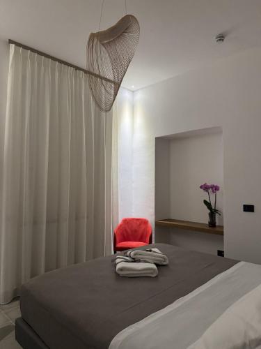 Letto o letti in una camera di Kalos Paestum Hotel