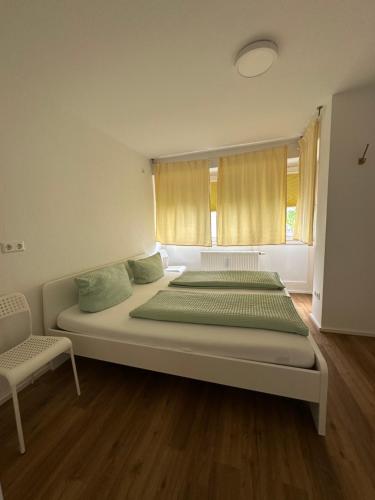 En eller flere senge i et værelse på SAINT TROPEZ by Europa-Park - EP Ticket Garantie