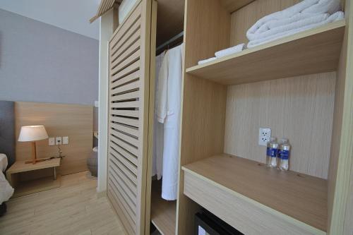 a bedroom with a bunk bed with two bottles of water at Nguyen Le Villa Long Hải in Long Hai
