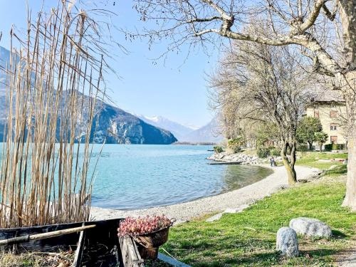 a view of a lake with mountains in the background at Apartment Martin Pescatore by Interhome in Verceia