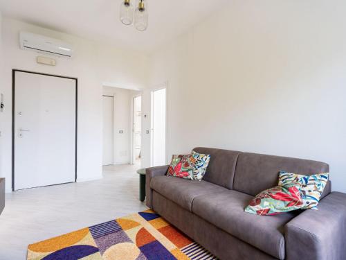 a living room with a couch and a rug at Apartment Casa Doni by Interhome in Villanova dʼAlbenga