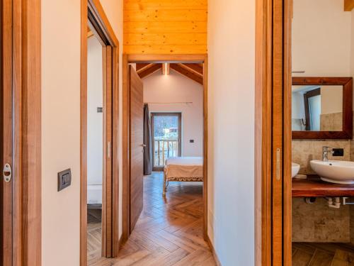 Katil atau katil-katil dalam bilik di Holiday Home Baita Ribes by Interhome