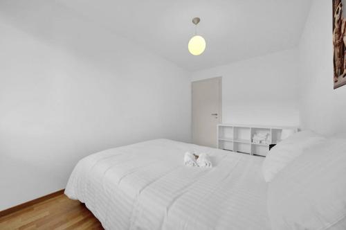 Postel nebo postele na pokoji v ubytování PEARL07 Appartement lumineux 2G