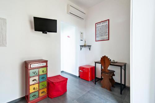Televisyen dan/atau pusat hiburan di Bed & Blues