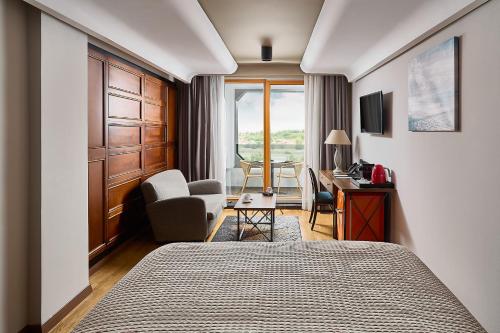 Postel nebo postele na pokoji v ubytování Park Hotel & Spa