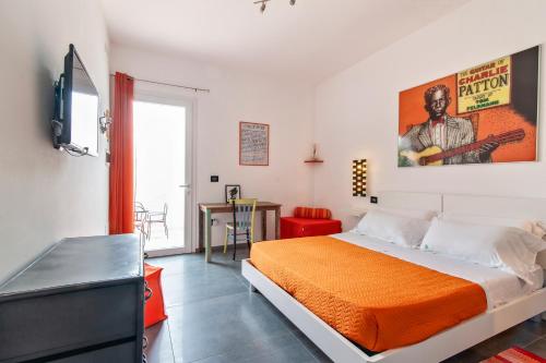 Postel nebo postele na pokoji v ubytování Bed & Blues