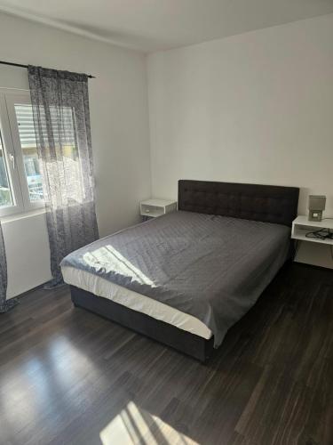Postel nebo postele na pokoji v ubytování Ivys apartman