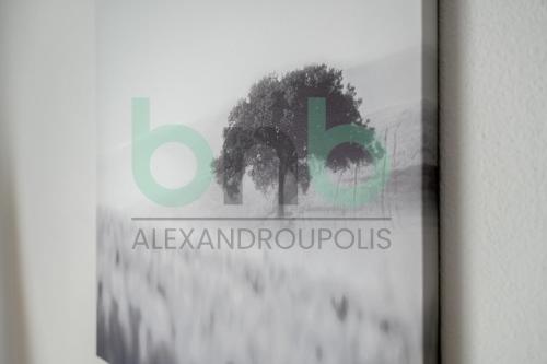 a book with a picture of a tree at Luxurious Tsimiski 3BDR 3rd Floor in Alexandroupoli