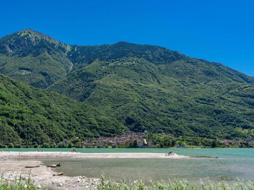 a body of water with mountains in the background at Apartment Svasso by Interhome in Verceia