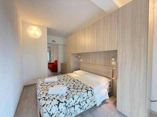 Postel nebo postele na pokoji v ubytování Gatto Marino Apartment