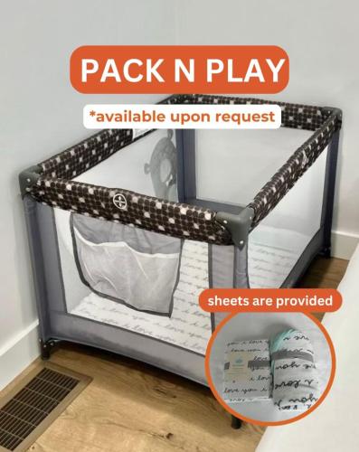 a black and white bunk bed with the words pack n play and the words available at Back-Bay Upscale Central Condo Rooftop & Parking in Boston