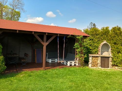 Taman di luar Mazurska Apartamenty