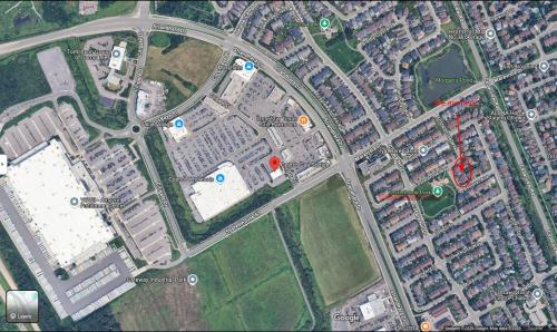 a map of a parking lot with a red circle at Fosterbrook Parkside Retreat in Ottawa