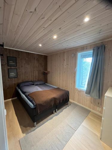 Ένα ή περισσότερα κρεβάτια σε δωμάτιο στο Modern chalet in Malangen