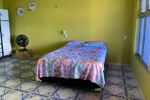 Postel nebo postele na pokoji v ubytování Paradise City