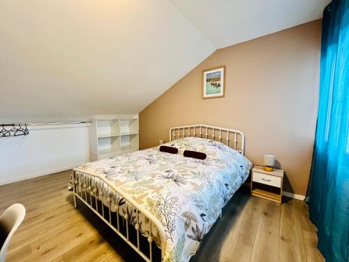 Ένα ή περισσότερα κρεβάτια σε δωμάτιο στο Home Family Duplex Talange