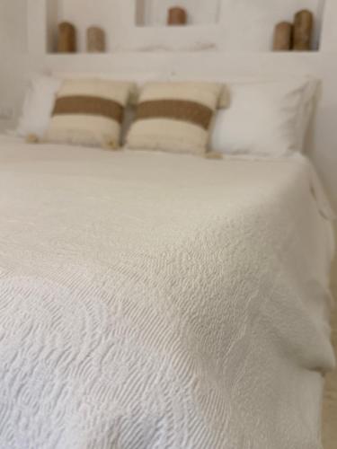 Letto o letti in una camera di Dimore i Messapi Suites Diffuse