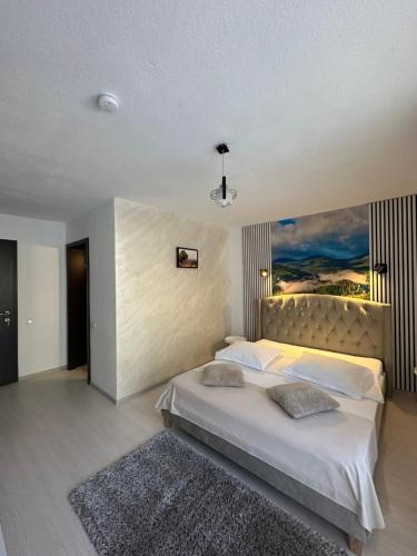 Φωτογραφία από το άλμπουμ του Căsuța de lângă izvor σε Moieciu de Sus