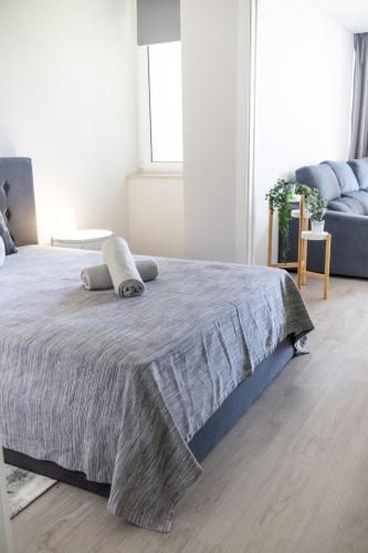 Ένα ή περισσότερα κρεβάτια σε δωμάτιο στο Green Tower 1106