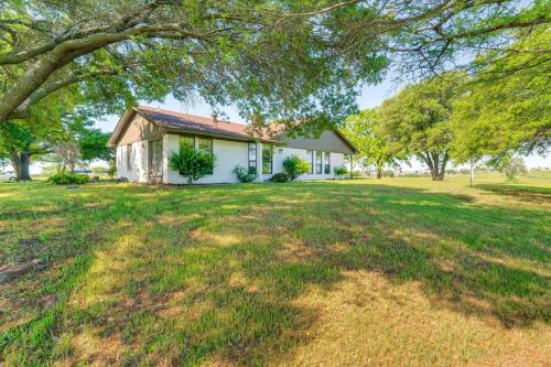 a house with a large yard in front of it at 8 Mi to Lewisville Lake Peaceful Countryside Home in New Hope