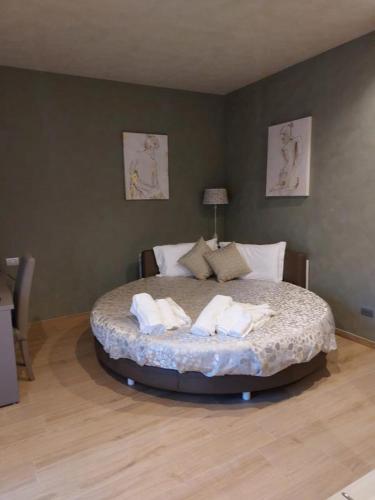 Notti O' Tunn Luxury Rooms in centroにあるベッド