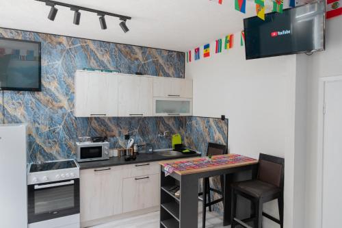 Η κουζίνα ή μικρή κουζίνα στο Hostel Four Rooms