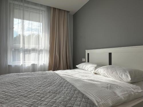 Katil atau katil-katil dalam bilik di Lazdyneliu Vingis Vilnius "Good Choice" Apartment - Self check-in