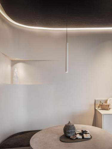 a room with a table with a pot on it at Zensi Retreat - Villa in Eurunderee