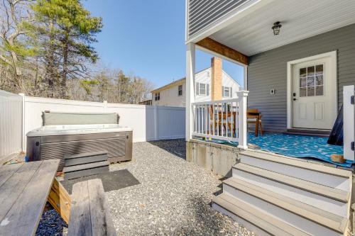a porch of a house with a hot tub at Steps to Short Sand Beach Retreat with Game Room! in York