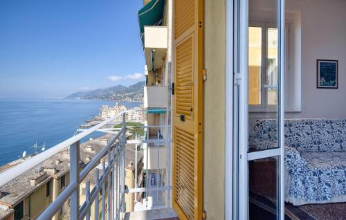 a balcony with a view of the ocean at 4 Bedroom Lovely Apartment In Camogli in Camogli