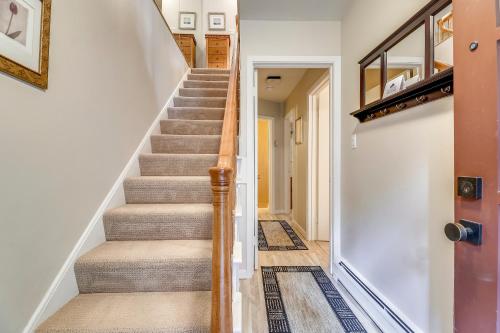 a staircase in a home with white walls at Aspen Townhome with Deck - Restaurant Row in Aspen