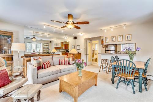 a living room with a couch and a table at Aspen Townhome with Deck - Restaurant Row in Aspen