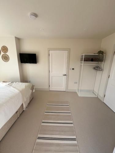 Postel nebo postele na pokoji v ubytování Mudeford Beach Guest Room