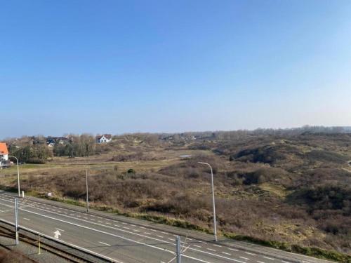 an empty highway with street lights on the side at Peaceful Villa in Borstendorf in Leubsdorf