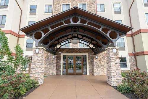 an entrance to a building with a door at Staybridge Suites Houston West - Energy Corridor by IHG in Houston