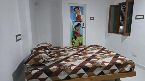 Ένα ή περισσότερα κρεβάτια σε δωμάτιο στο VMG Residency