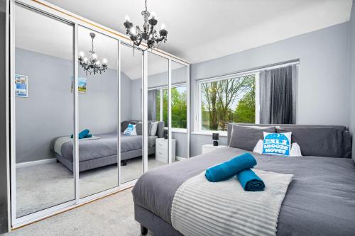 Ένα ή περισσότερα κρεβάτια σε δωμάτιο στο The Relocation Haven - Birmingham