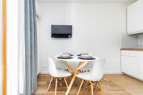 TV a/nebo společenská místnost v ubytování Apartamenty nad morzem Mierzeja Wiślana Mikoszewo