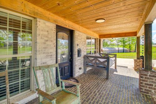 a porch of a house with a wooden roof at Great Outdoor Space Margys Farmhouse in Jasper in Jasper