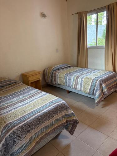 Postel nebo postele na pokoji v ubytování Duplex 2 dormitorios
