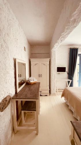 Ένα ή περισσότερα κρεβάτια σε δωμάτιο στο Mina Otel by Adda Alaçatı