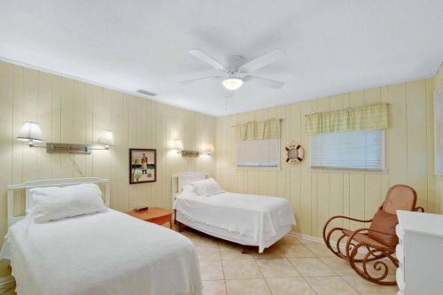Ένα ή περισσότερα κρεβάτια σε δωμάτιο στο Swan Cottage