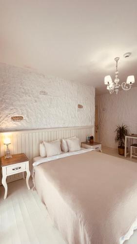 Ένα ή περισσότερα κρεβάτια σε δωμάτιο στο Mina Otel by Adda Alaçatı