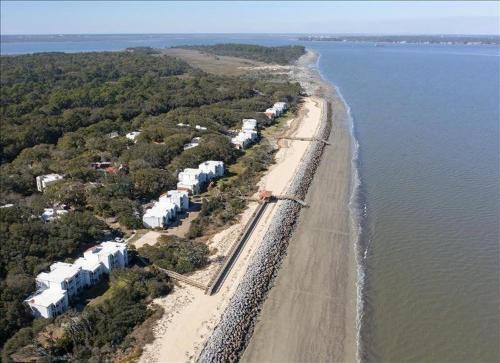 an aerial view of a beach next to the water at Villa 377 Turtle Villa in Jekyll Island